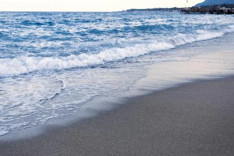 Blue waves in the sand Stock Photos