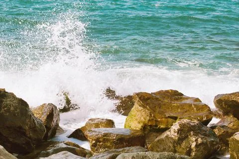 Blue waves on the seashore Stock Photos