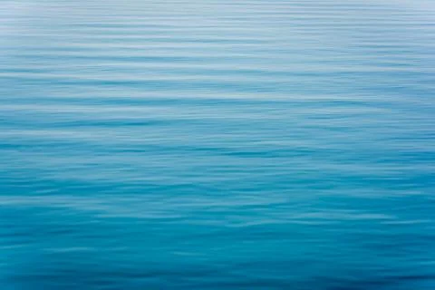 Blue waves on the surface of the sea Stock Photos