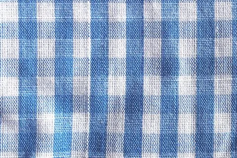 Blue white colored textile texture. Color fabric background. Stock Photos
