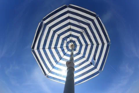 Blue white parasol Stock Photos