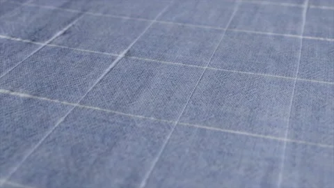 Blue white tablecloth, picnic gingham is waving. Close up macro shot checkere Video stock 147223637