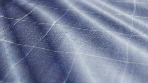 Blue white tablecloth, picnic gingham is waving. Close up macro shot checkere Video stock 147223639