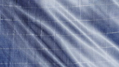 Blue white tablecloth, picnic gingham is waving. Close up macro shot checkere Video stock 147223646