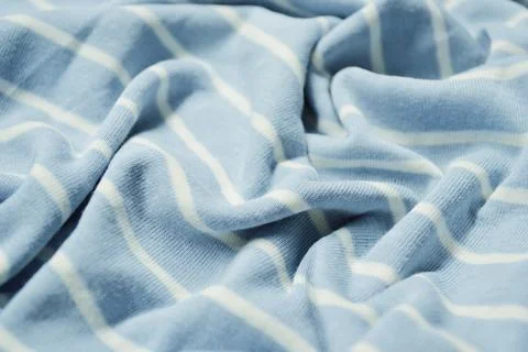 Blue with white thin stripes textile. Blue material texture on fabric Stock Photos