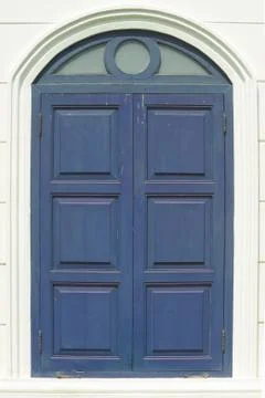 The blue window colonial style. Stock Photos