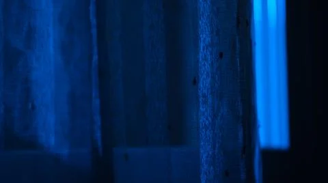 Blue window with light coming throw. Blue light. Stock Photos