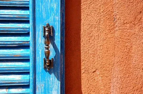 Blue window on Orange Wall Stock Photos