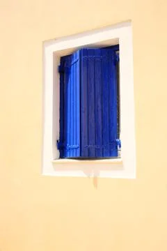 Blue window shutters Stock Photos