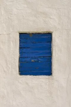 Blue window on a white wall abstract Stock Photos