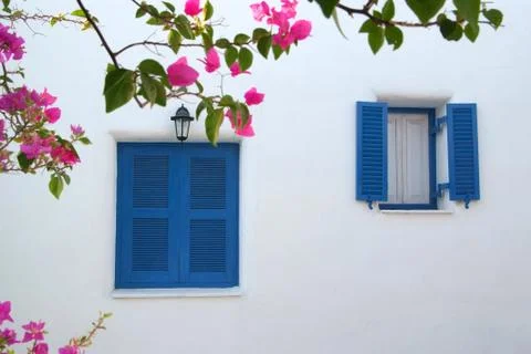 Blue window on the white wall 스톡 사진