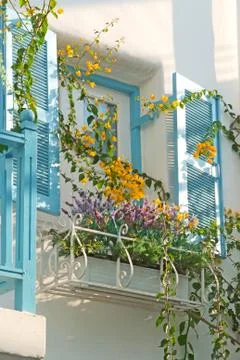 Blue window on the white wall Stock Photos
