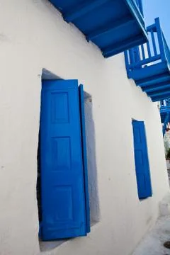 Blue windows in mykonos, greece Stock Photos