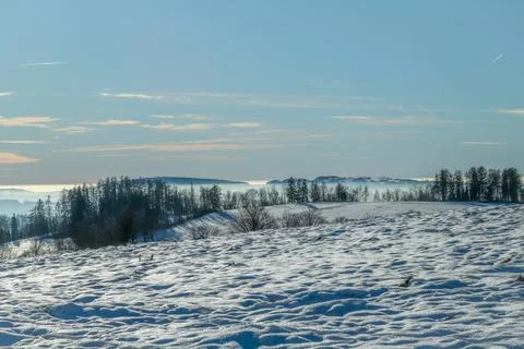 Blue winter day with inversion in valleys near Roprachtice village Stock Photos