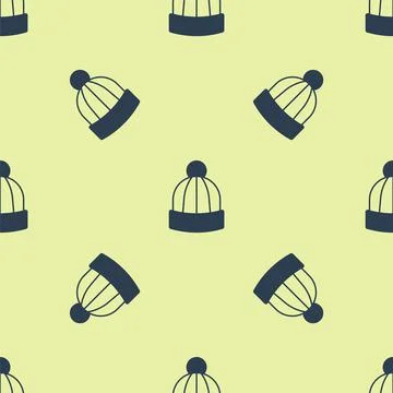 Blue Winter hat icon isolated seamless pattern on yellow background. Vector Illustrazione stock