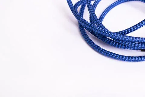 Blue wire to connect the device on white background Stock Photos