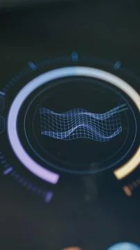 Blue wireframe surface undulates inside a circular performance gauge Stock Photos