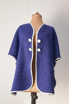 Blue wool jacket with white buttons, natural fabric Stock Photos