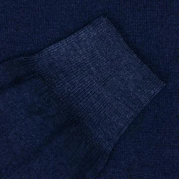 Blue wool pullover sleeve close up Stock Photos