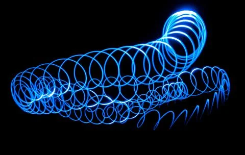 A blue worm of bright light Stock Photos