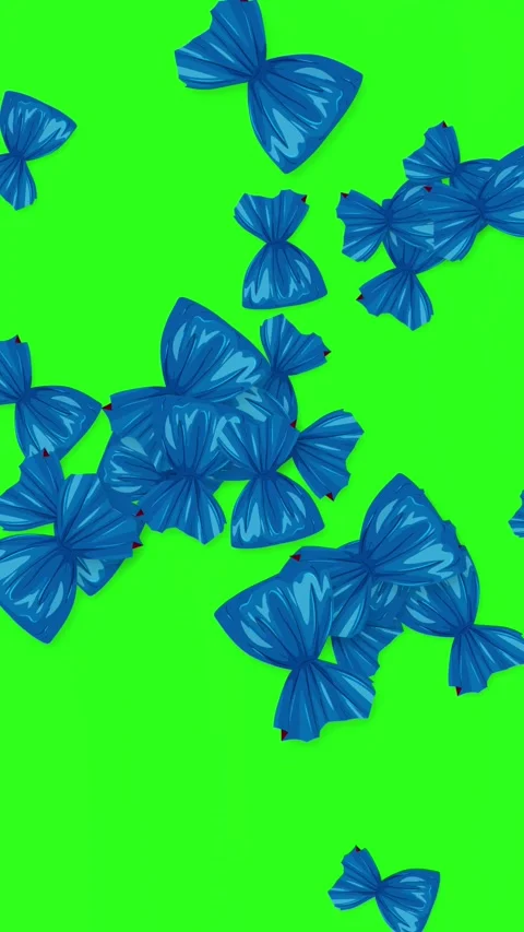 Blue Wrapped Candy Objects Bursting Across Bright Green Background Stock Footage 346116511