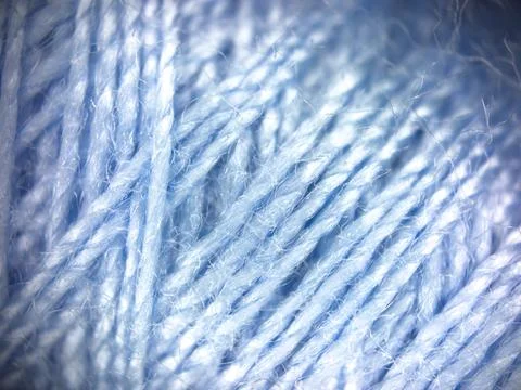 Blue yarn thread texture close up macro concept for knitting, textile industry, 库存照片