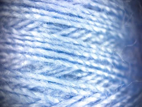 Blue yarn thread texture close up macro concept for knitting, textile industry, 库存照片