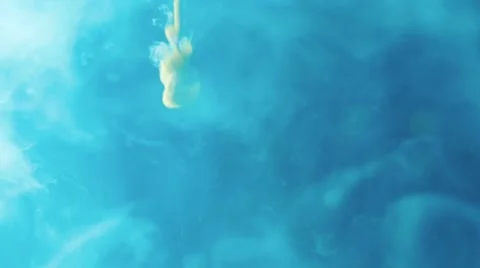 Blue yellow blobs falling Stock Footage 44562625