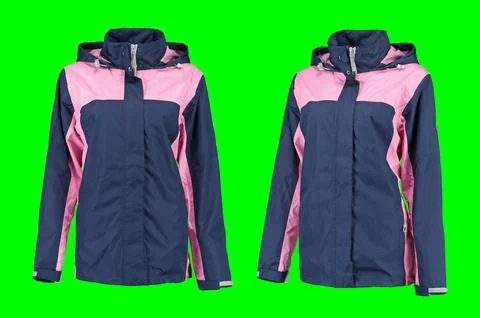 Blue zip-up raincoat with pink inserts. Isolated image on a green background. Stock Photos