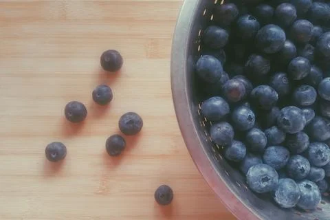 Blueberries in a colander Stock Photos