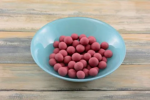 Blueberries dipped in ruby cacao chocolate Foto stock