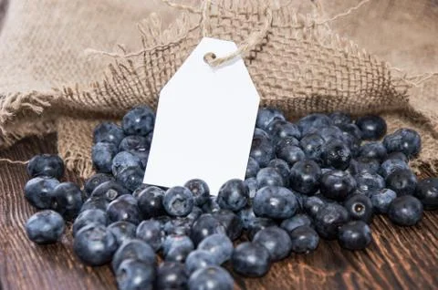 Blueberries with empty tag Stock Photos