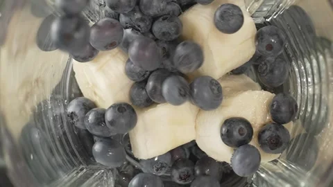 Blueberries Falling into Blender with Bananas Stock Footage 315033372