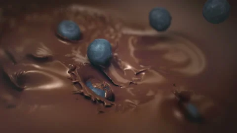 Blueberries Falling Into Liquid Chocolate in 4K Super slow motion Stock-Footage 139445957