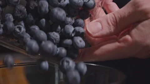 Blueberries falling slow motion Stock Footage 149944898