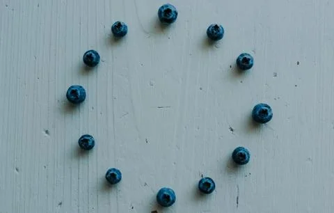 Blueberries folded in a circle on white background Stock Photos