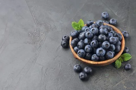 Blueberries with mint Stock Photos