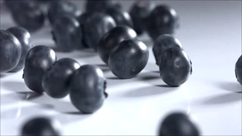 Blueberries Rolling Down on White Background. Slow Motion Stock Footage 156326033