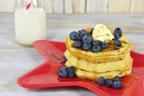 Blueberries on waffle stack Stock Photos