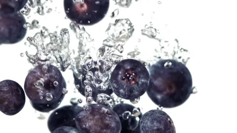 Blueberries in water on white background Video stock 229316061