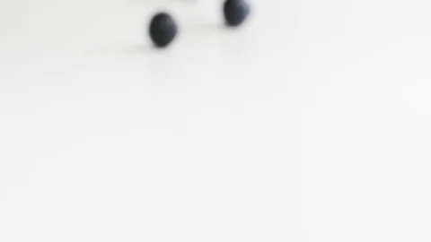 Blueberry berries roll towards the camera Stock Footage 84975655