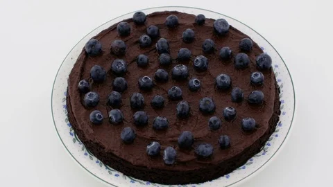 Blueberry Cake on Turntable - White Background Stock Footage 75718896