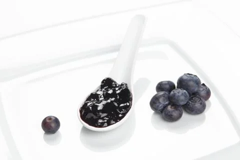 Blueberry jam on a plate Stock Photos