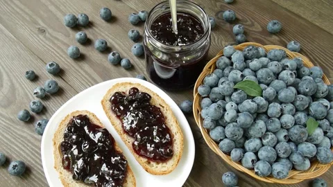 Blueberry jam on the table. Stock Footage 296005748