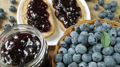 Blueberry jam on the table. Stock Footage 297365015