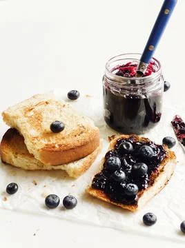 Blueberry jam toasts Stock Photos