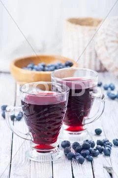 Blueberry juice Stock Photos