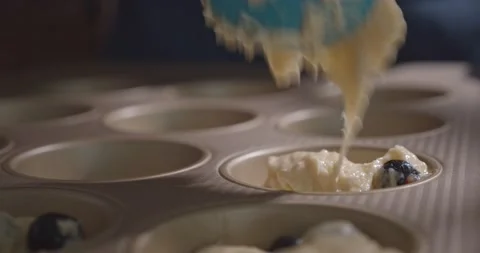 Blueberry muffin batter Stock Footage 149944962