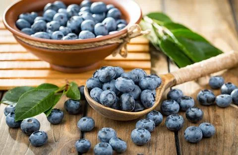 Blueberry on old background Stock Photos