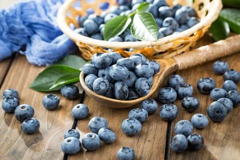 Blueberry on old background Stock Photos